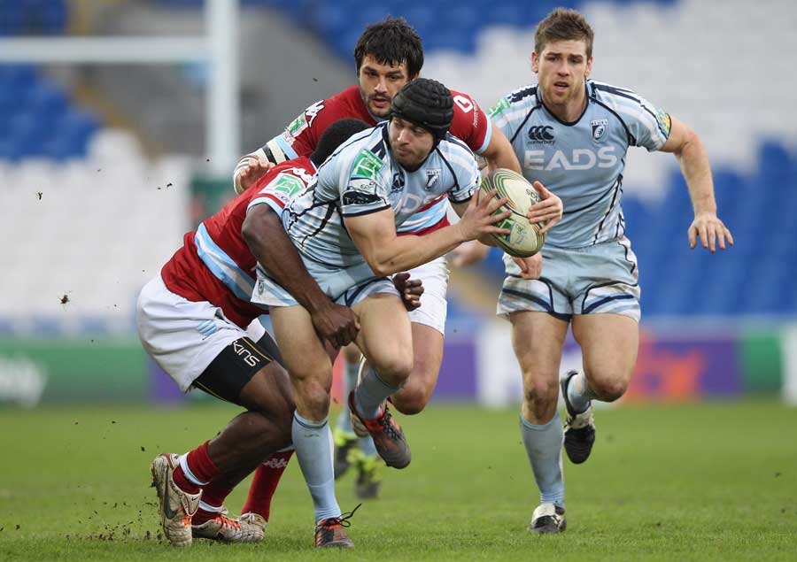 Cardiff Blues wing Leigh Halfpenny attempts to offload