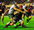 Edinburgh's Netani Talei forces his way over for a try