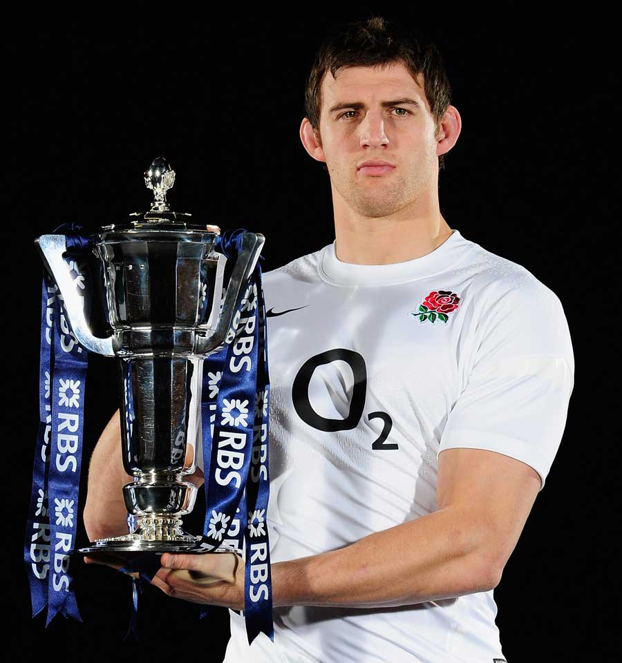 England's Tom Wood grips the Six Nations trophy