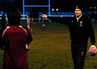 England's Chris Ashton hands out advice during a training session with Under-13s