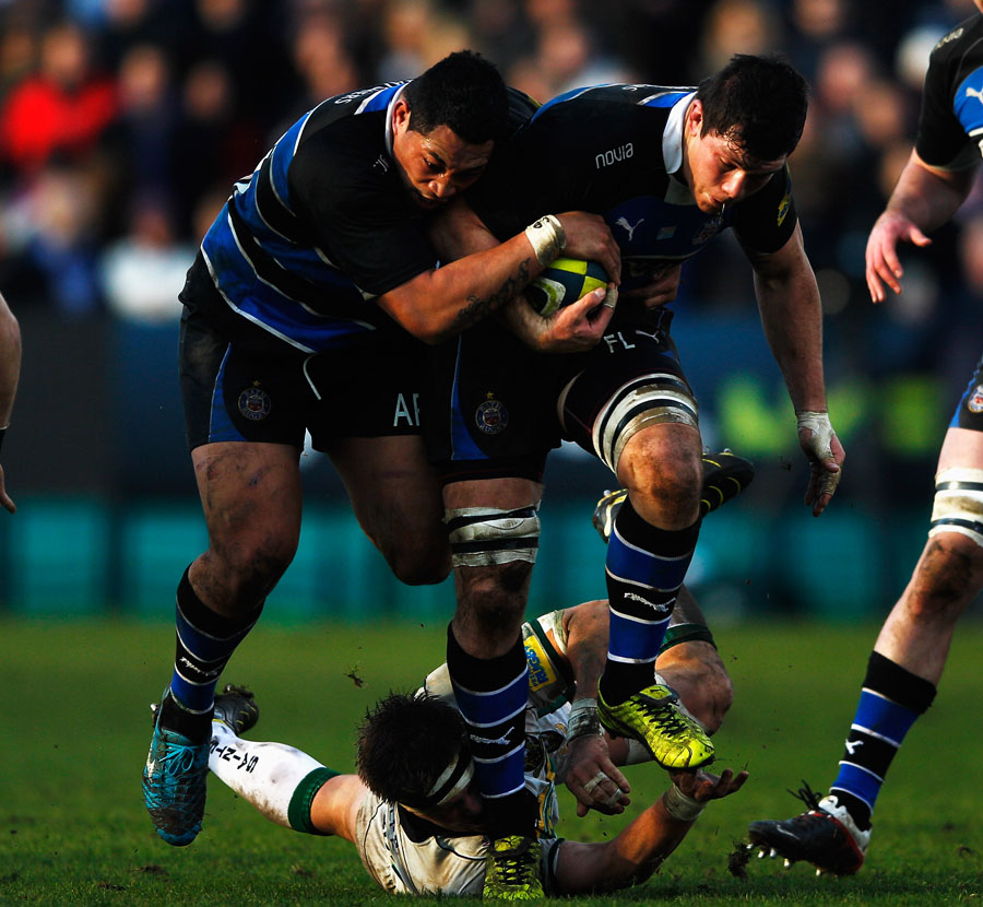 Bath flanker Francois Louw is given a little support from Anthony Perenise
