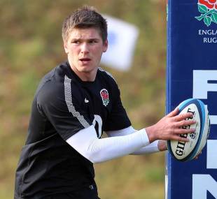 England's Owen Farrell looks to shift the ball during training, Pennyhill Park, Bagshot, Surrey, January 31, 2012