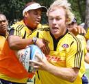 The Stormers' Schalk Burger tries to make a break during training