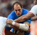 Italy's Sergio Parisse finds his way blocked by the French defence