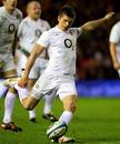 England's Owen Farrell lines up a kick 