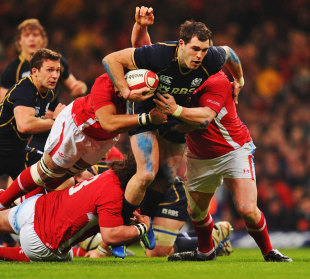 Scotland's Sean Lamont stretches the Wales defence, Wales v Scotland, Six Nations, Millennium Stadium, Cardiff, Wales, February 12, 2012