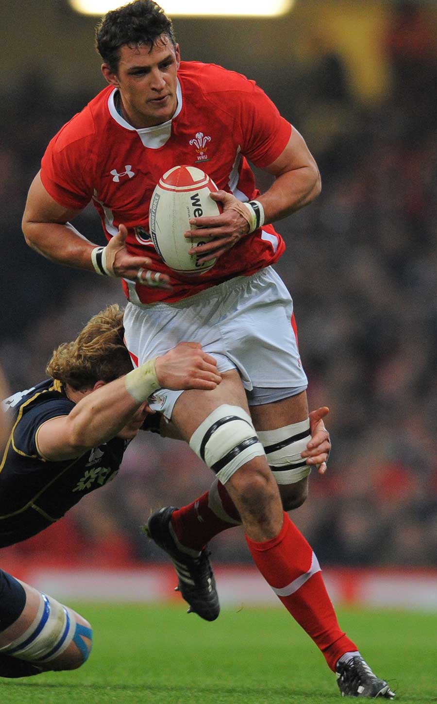 Wales' Aaron Shingler tries to make some inroads