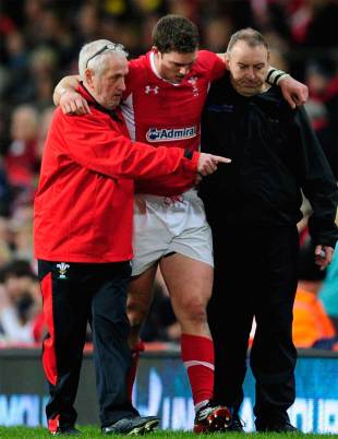 Wales' George North is helped from the field, Wales v Scotland, Six Nations, Millennium Stadium, Cardiff, Wales, February 12, 2012