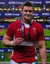 Wales' Dan Lydiate displays his man of the match award