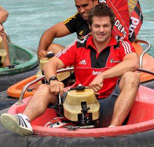 Crusaders skipper Richie McCaw tries his hand at bumper boats at the Kiwi launch of Super Rugby, Auckland, New Zealand, February 14, 2012