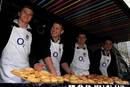 Four England stars hand out pies to the public