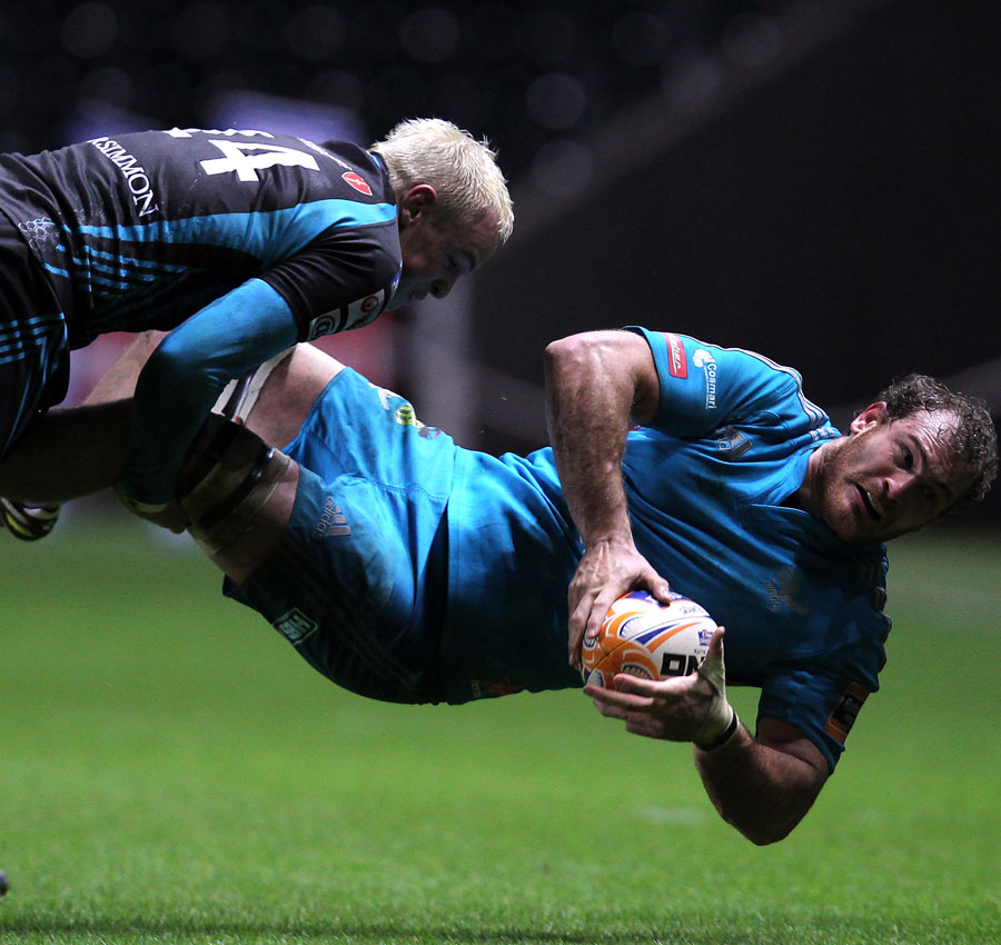 Aironi's Naas Olivier is taken out by the Ospreys' Hanno Dirksen