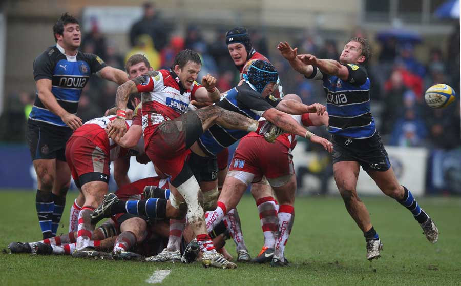 Gloucester scrum-half Rory Lawson's kick is charged down
