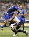 Western Force centre Rory Sidey is shackled by the Brumbies' defence
