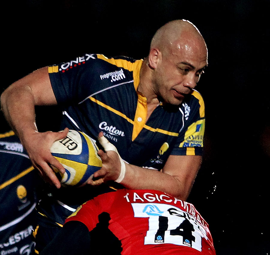 Worcester's Dale Rasmussen is tackled by Saracens' Michael Tagicakibau