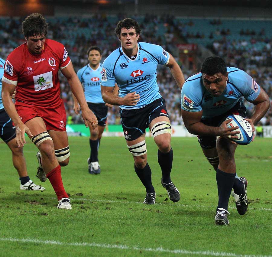 Waratahs No.8 Wycliff Palu charges in at the corner