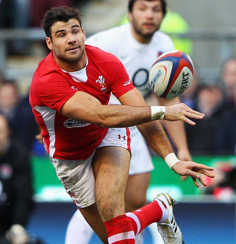 Wales scrum-half Mike Phillips tries to ignite his backs
