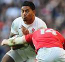 Manu Tuilagi braces himself for the hit from Alex Cuthbert