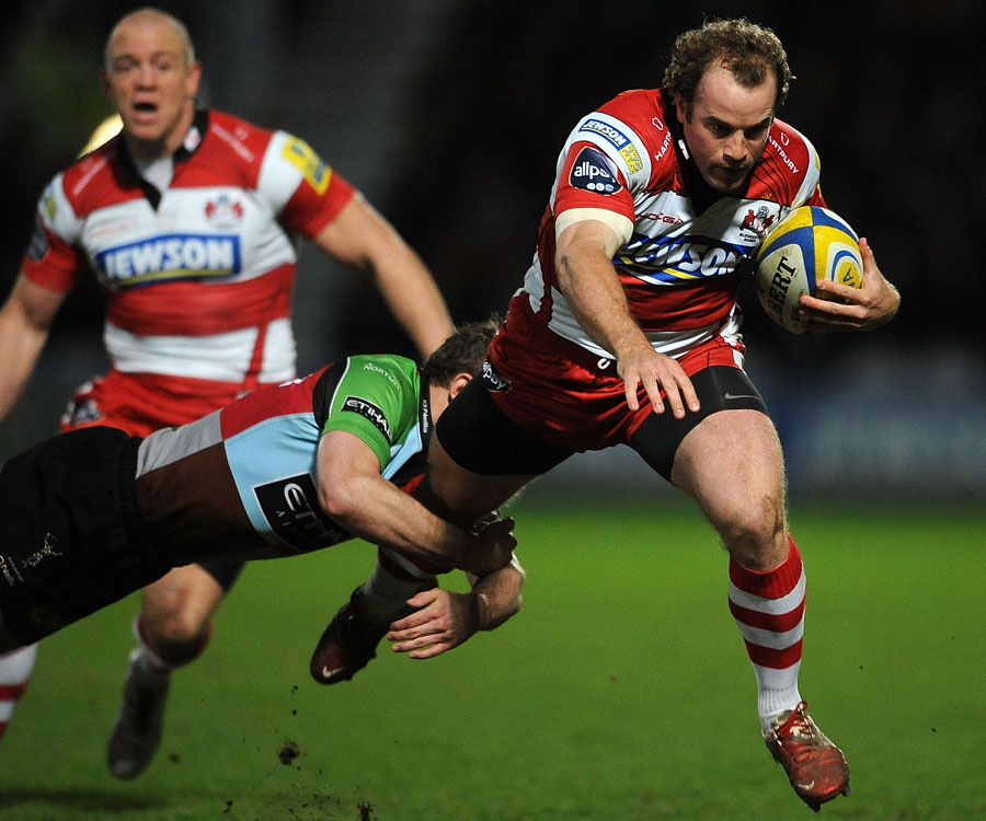 Gloucester's James Simpson-Daniel is caught by a tackle