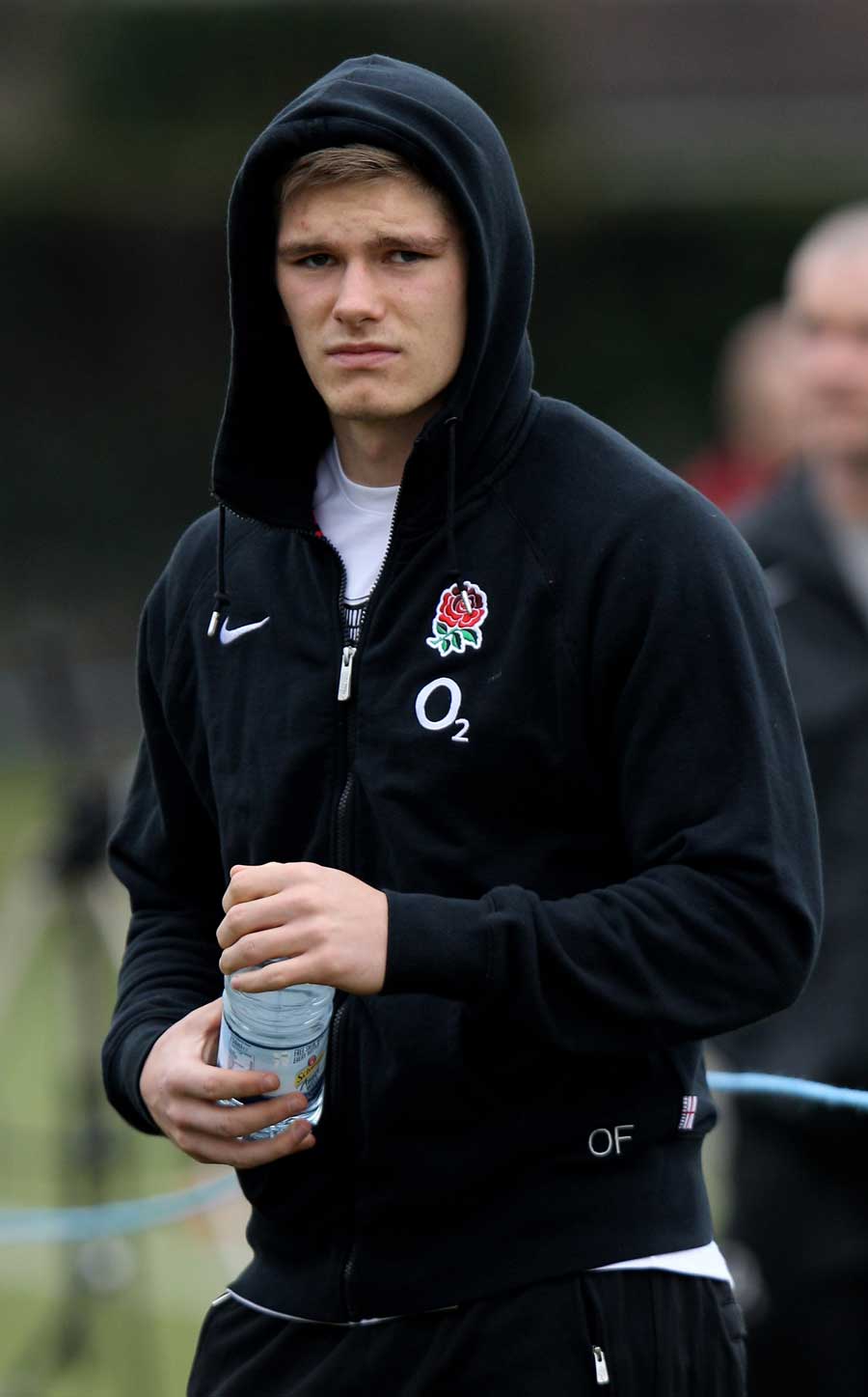 Injured Owen Farrell watches on from the sidelines during training
