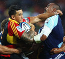 The Chiefs' Sonny Bill Williams takes on the Blues' Jerome Kaino