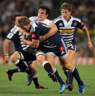 Stormers centre Jean de Villiers is stopped in his tracks