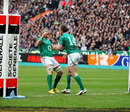 Ireland's Jamie Heaslip congratulates team-mate Tommy Bowe