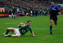 Ireland winger Tommy Bowe slides over for a try