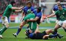 Ireland flanker Sean O'Brien is smashed by Thierry Dusautoir