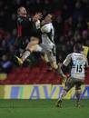 Saracens wing James Short rises highest for a high ball
