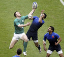 Tommy Bowe and Clement Poitrenaud vie for a high ball