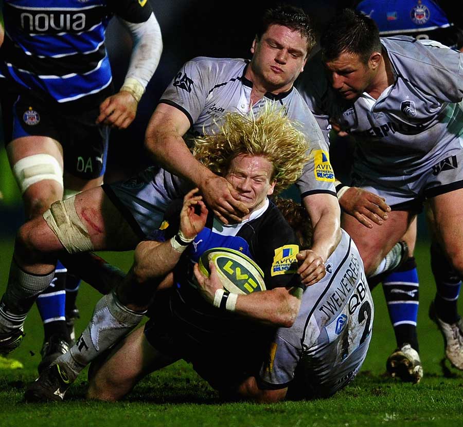Tom Biggs feels the force of the Tigers defence, Bath Rugby v Leicester Tigers, Anglo-Welsh Cup, The Recreation Ground, Bath, London, March 9, 2012