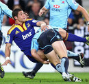 The Highlanders' Phil Burleigh is upended 