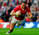 Wales' Jamie Roberts dives over to score
