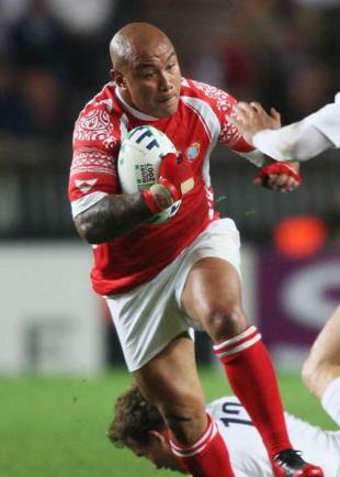 Nili Latu of Tonga is challenged by Mathew Tait of England during the Rugby World Cup 2007 Pool A match between England and Tonga at the Parc des Princes in Paris, France on September 28, 2007.