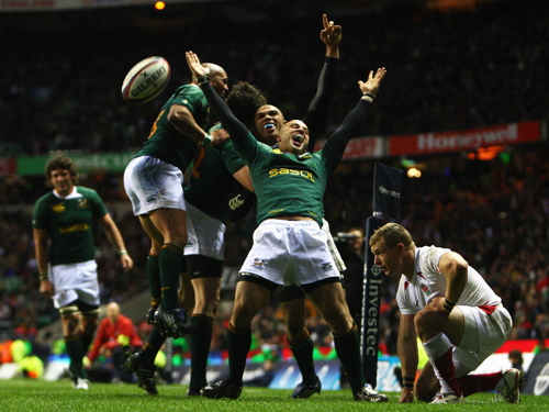 Bryan Habana of South Africa celebrates his try with team mate Conrad Jantjes as South Africa crush England at Twickenham 