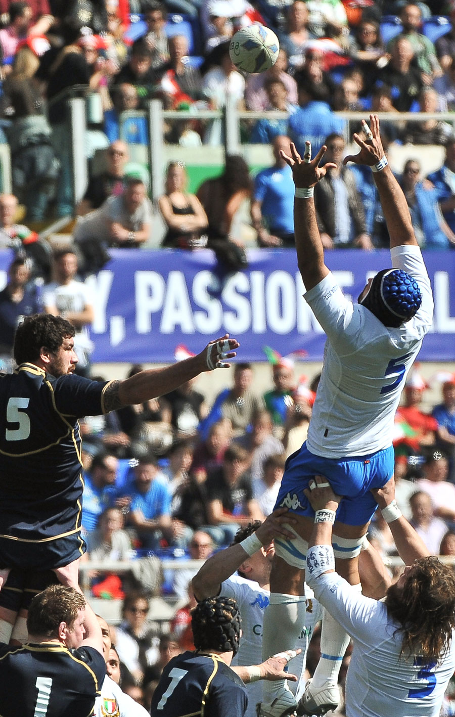 Italy's Marco Bortolami stretches for a lineout