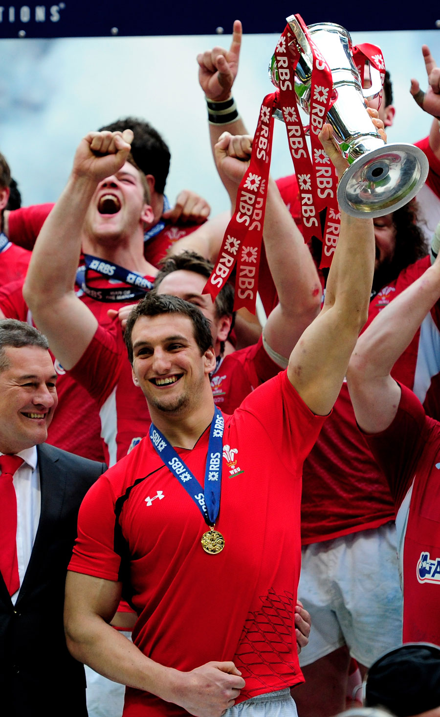 Wales captain Sam Warburton lifts the Six Nations silverware