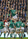 Ireland's Jamie Heaslip stretches for a lineout ball