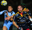 Newcastle's Jimmy Gopperth and Worcester's Andy Goode chase the ball
