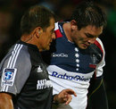 The Rebels' Gareth Delve listens to the advice of referee Marius Jonker