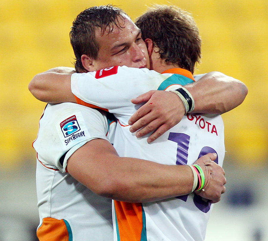 The Cheetahs' Coenie Oosthuizen and Johan Goosen celebrate victory