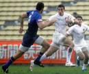 England's Chris Brightwell charges through a gap in the French defence
