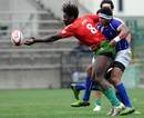 Portugal's Aderito Esteves forces an offload against Samoa