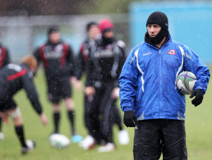 Edinburgh's coach Michael Bradley feels the chill during a training session