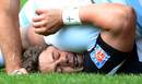 The cheek of it: Brive's Ronald Cooke is flattened