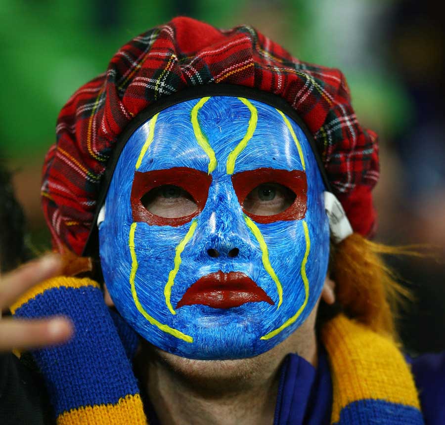 A Highlanders fan watches on as his side take on the Blues