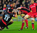 Saracens' Ernst Joubert takes on the Newcastle defence
