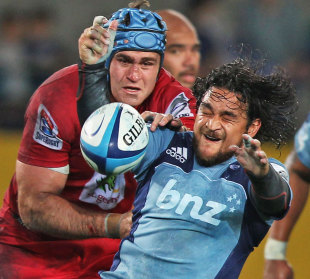The Blues' Piri Weepu gets rid of the ball under pressure, Blues v Reds, Super Rugby, Eden Park, Auckland, New Zealand, April 27, 2012