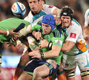 The Highlanders' James Haskell is swamped by the Cheetahs' defence